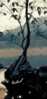 Futuristic black motorcycle near a lake.