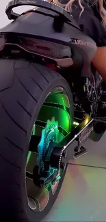 Close-up of futuristic motorcycle with neon lights.