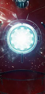 Mobile wallpaper with glowing arc reactor in red armor design.