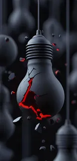 A cracked black light bulb with red glow and floating shards.