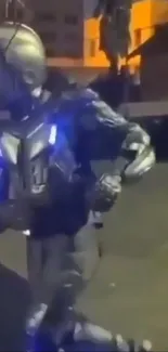 Futuristic metallic robot on a city street at night.