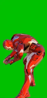 Red and white superhero posing on a bright green background.