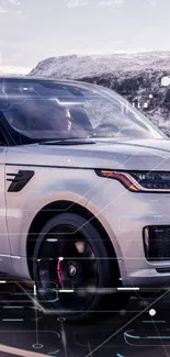 Sleek SUV with digital effects on a snowy mountain road.