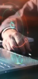 Hand interacting with digital interface over laptop.