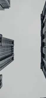 Monochrome urban skyline with tall buildings.