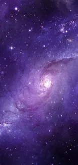 Purple galactic spiral with stars in deep space background.