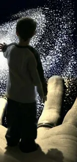 Child on giant hand gazing at a galaxy