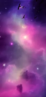 Purple and pink galaxy wallpaper with stars and nebulae.