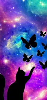 Silhouette of a cat with butterflies against a colorful galaxy background.