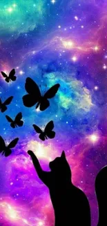 Silhouette of a cat with butterflies in a colorful galaxy background.