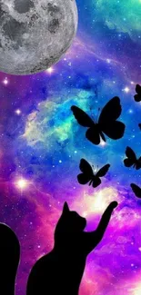 Galaxy wallpaper with cat reaching butterflies under a moonlit sky.