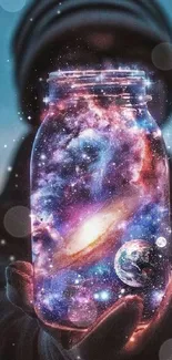 A person holding a jar with a vivid galaxy scene inside, set against a dark background.