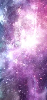 Vibrant galaxy nebula wallpaper with pink and blue hues for mobile devices.