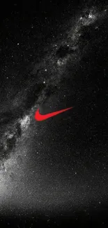 Starry galaxy wallpaper with red swoosh on black night sky.