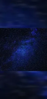 Dark blue galaxy wallpaper with stars.