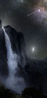 Majestic waterfall under Milky Way night sky.