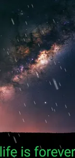 Galaxy illuminated night sky with text 'life is forever' at the bottom.