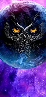 Intricate owl design on galaxy-themed wallpaper.