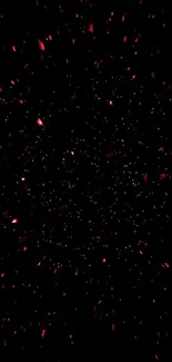 Mobile wallpaper with red speckled galaxy on black background.