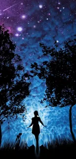 Silhouette against a vibrant starlit galaxy night sky.