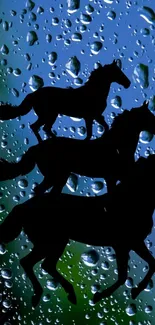 Three black horse silhouettes on dewy blue background with raindrop patterns.