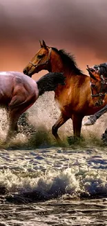 Three horses galloping through ocean waves on a sunlit beach.