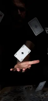 Floating playing cards in a dark background.