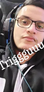 Person wearing a gaming headset with the text 'Triggguuuu' overlay.