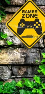 Gamer zone sign with controller on stone wall with ivy.