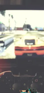 Person holding controller in front of racing game screen.