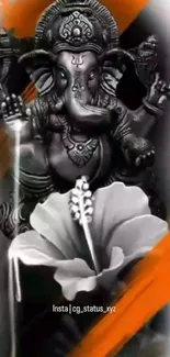 Black and white Ganesha statue with orange accents.