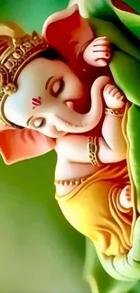 Ganesha figurine on a vibrant green leaf.