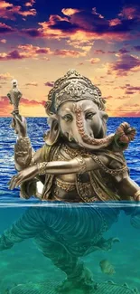 Ganesha statue beneath ocean sunset with azure blue and orange hues.