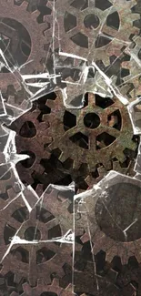 Mobile wallpaper with brown gears and cracked effect.