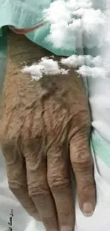 Elderly hand resting on a hospital bed.