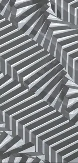 Abstract geometric 3D pattern in shades of gray.