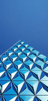 Geometric blue structure against clear sky