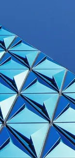 Geometric blue abstract mobile wallpaper with angular patterns.