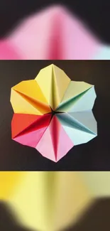 Vibrant geometric origami art wallpaper with colorful paper folds.