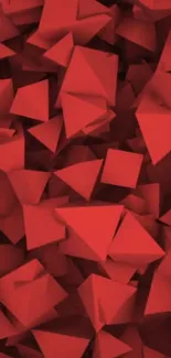 Red geometric 3D shapes create an abstract phone wallpaper.