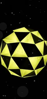 Yellow geometric sphere on black background wallpaper.