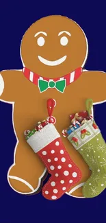 Gingerbread man with Christmas stockings on dark blue background.