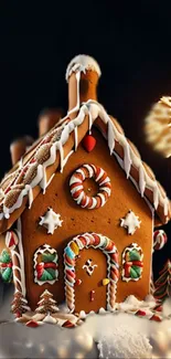 Decorative gingerbread house with festive lighting and candy details.