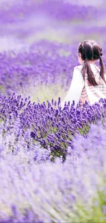 Girl walks through vibrant lavender fields in serene mobile wallpaper.