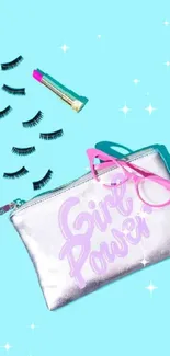 Cyan background with 'Girl Power' clutch and pink glasses.