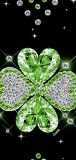 Green clover with diamonds on black background.