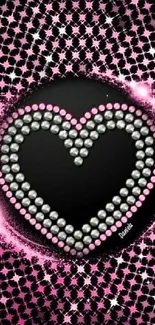 Mobile wallpaper with a glittery heart design in pink and black.