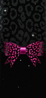 Pink leopard bow on elegant black background wallpaper.