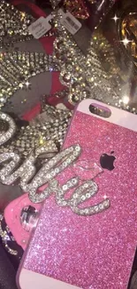 Glam pink mobile wallpaper with sparkles and jewels.