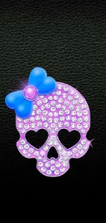 Glamorous rhinestone skull wallpaper with blue bow.